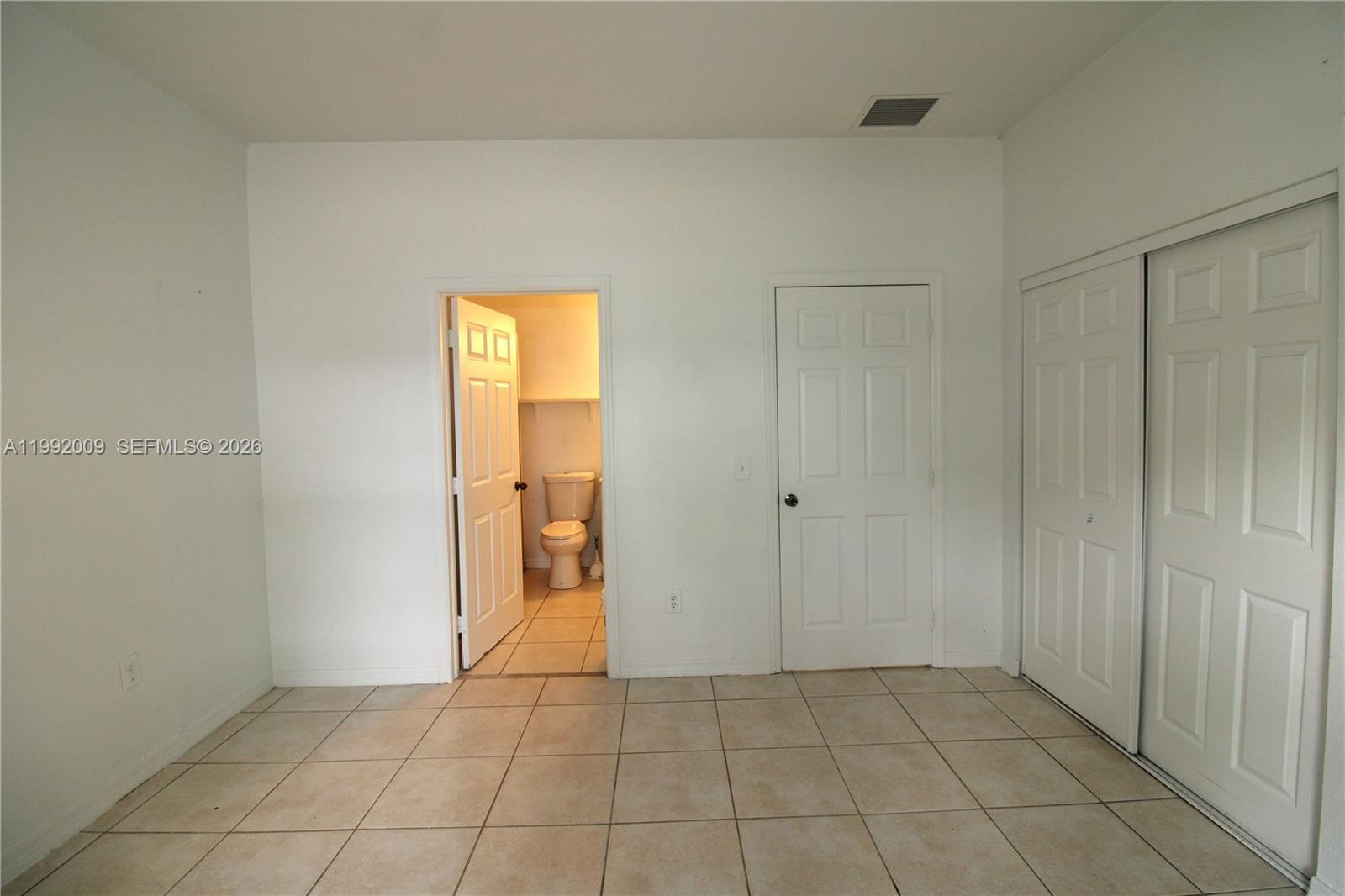 13929 Southwest 282nd Street Homestead, FL 33033 - Photo 18 of 30 a view of an empty room