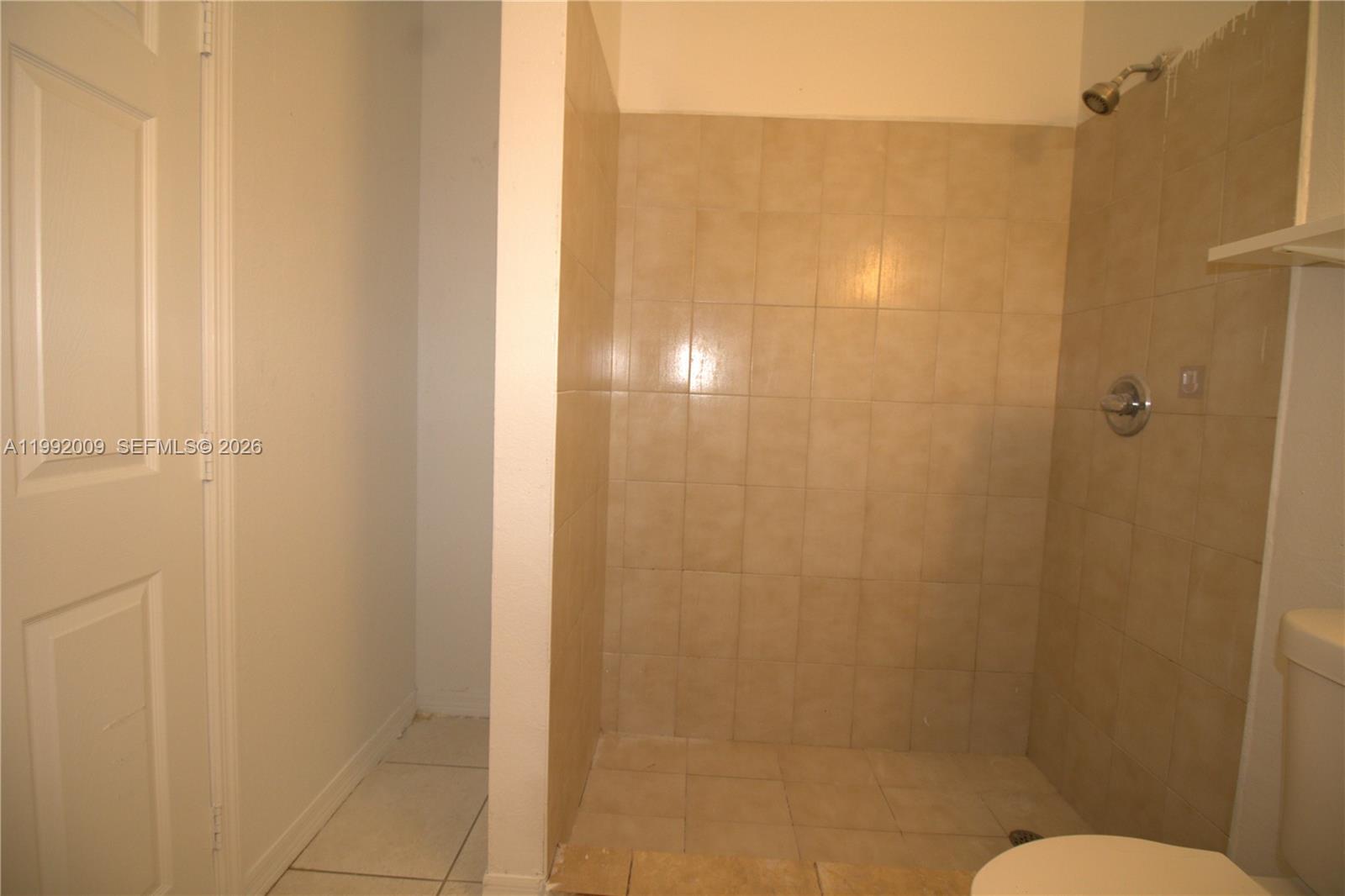 13929 Southwest 282nd Street Homestead, FL 33033 - Photo 21 of 30 a bathroom with a shower