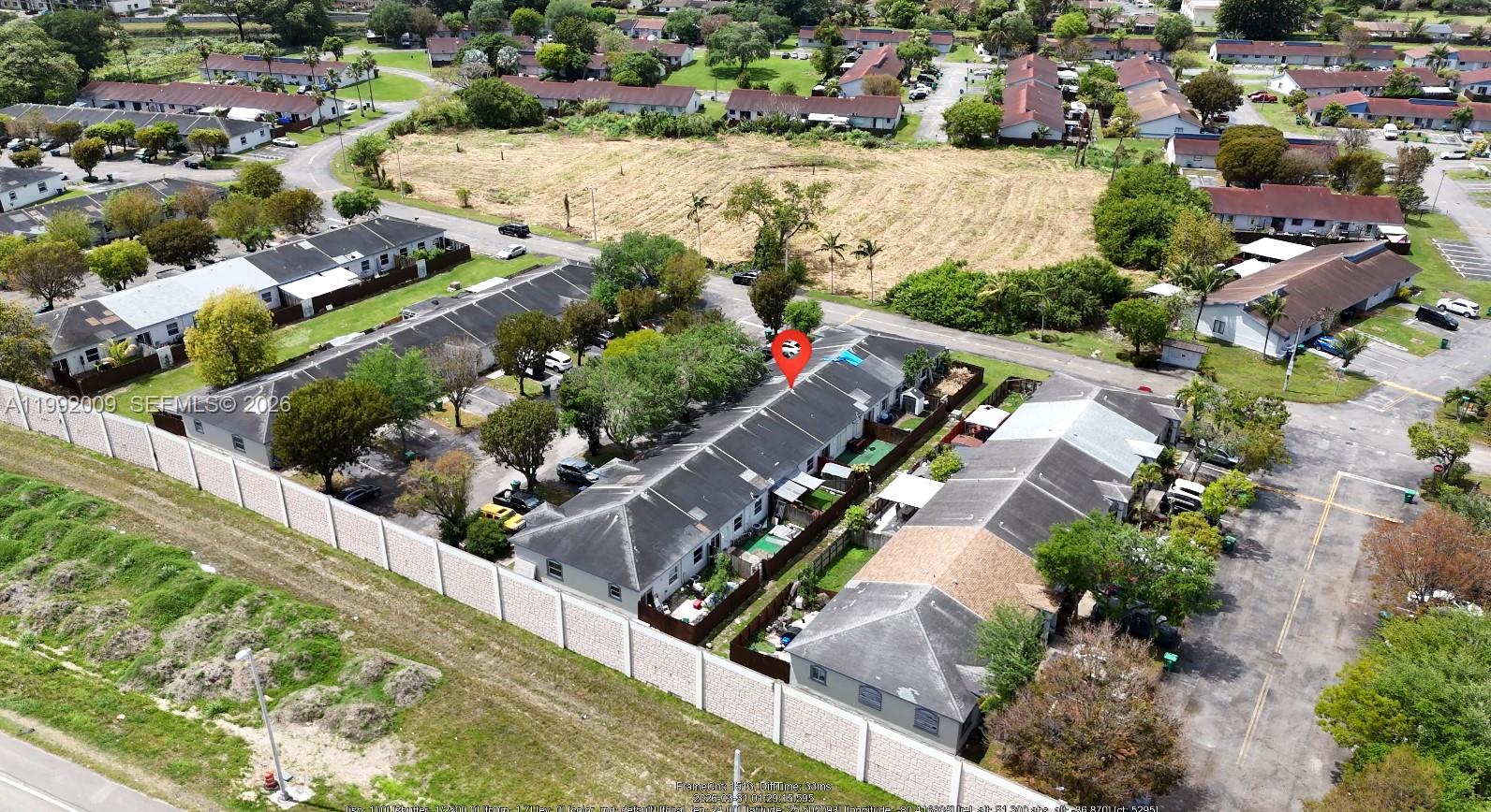 13929 Southwest 282nd Street Homestead, FL 33033 - Photo 4 of 30 an aerial view of a city