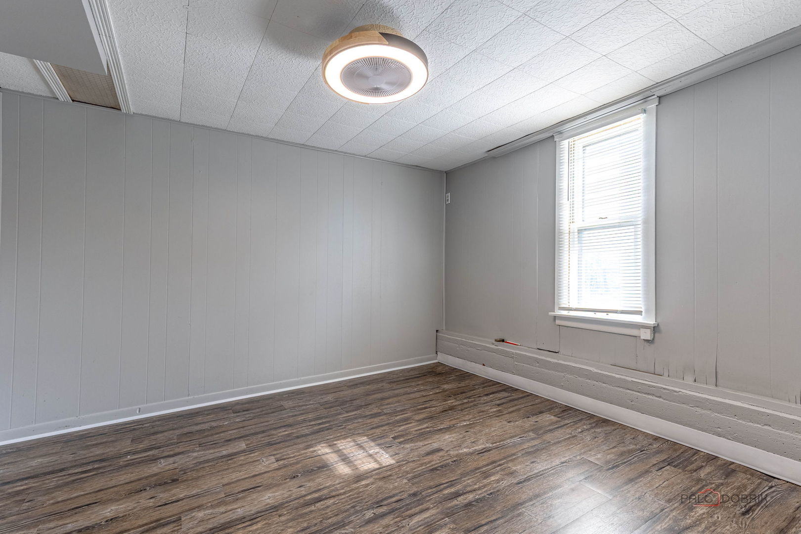 163 Eagle Point Road, Unit 1 Fox Lake, IL 60020 - Photo 17 of 26 a view of a room that has wooden floor and window