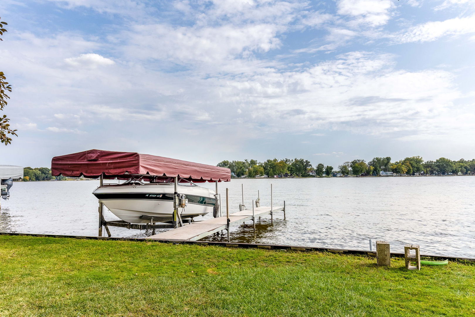163 Eagle Point Road, Unit 1 Fox Lake, IL 60020 - Photo 21 of 26 a view of a lake with a big yard