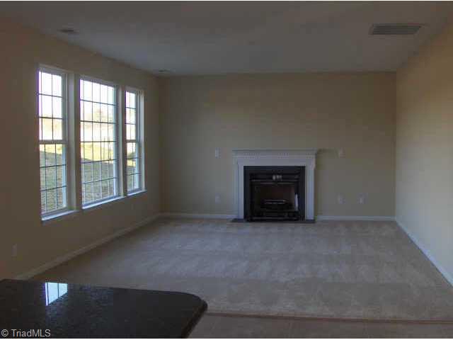3005 Sycamore Point Trail High Point, NC 27265 - Photo 4 of 9 Other. Large Family room with lots of natural light and gas fireplace