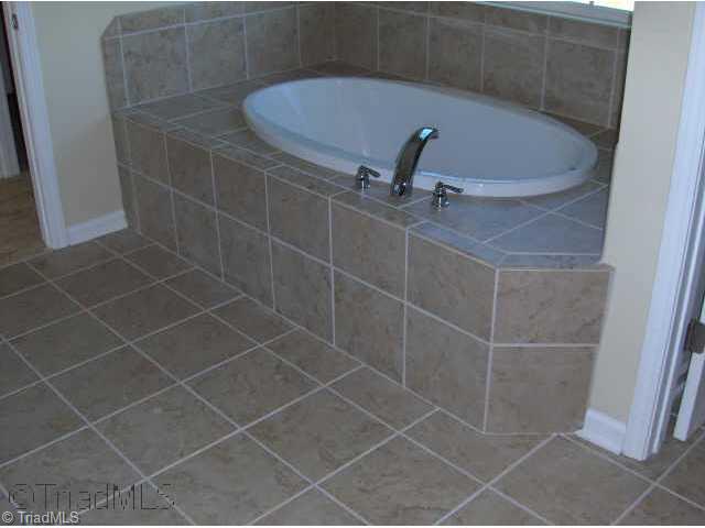 3005 Sycamore Point Trail High Point, NC 27265 - Photo 8 of 9 Other. Luxurious soaking with tile surround and backsplash