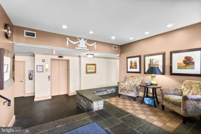 a living room with furniture and a couch