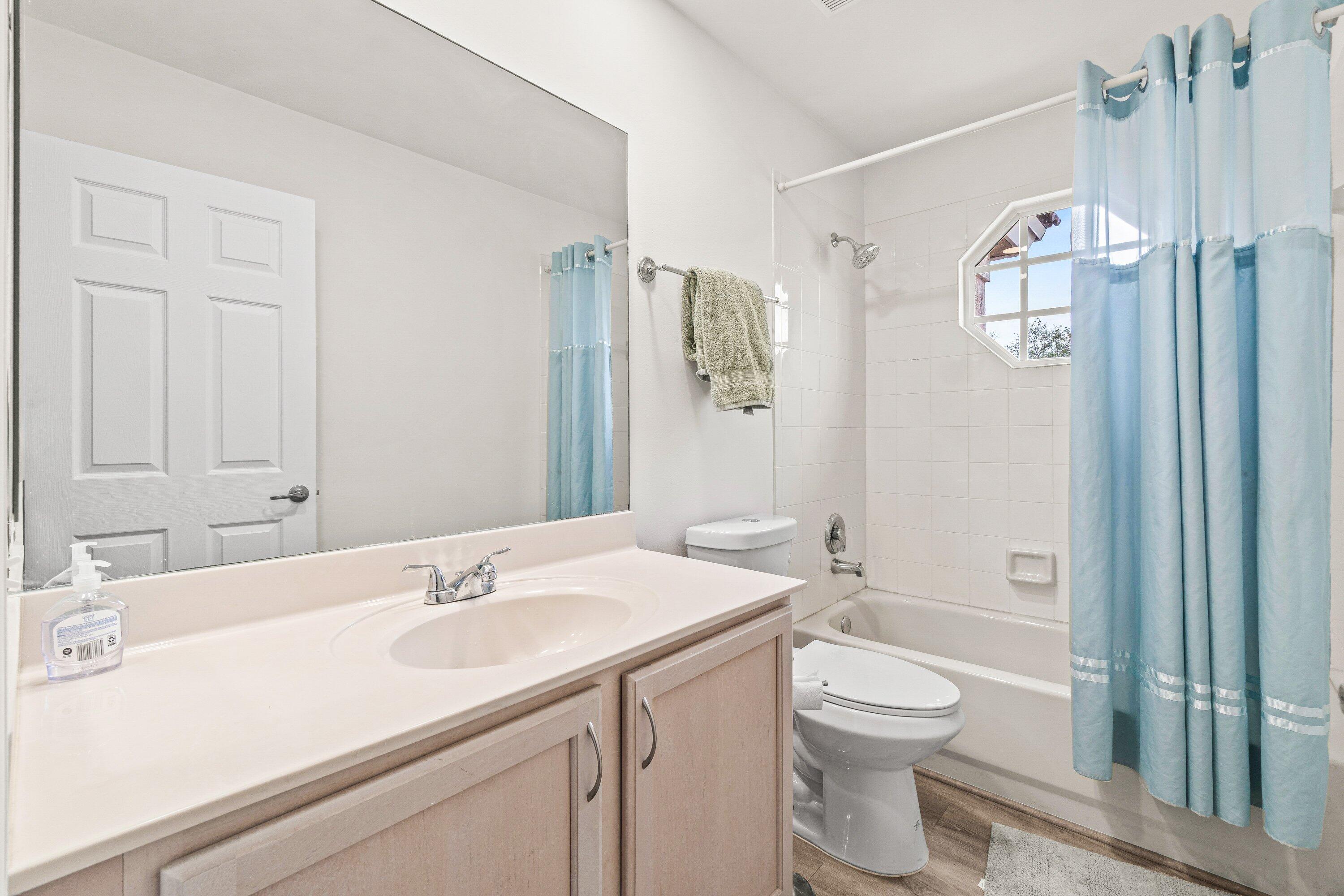 21256 Vía Fiore Boca Raton, FL 33433 - Photo 21 of 42 a bathroom with a sink toilet and shower