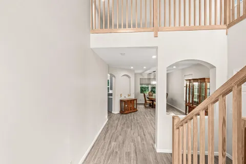 a view of a livingroom with furniture and wooden floor