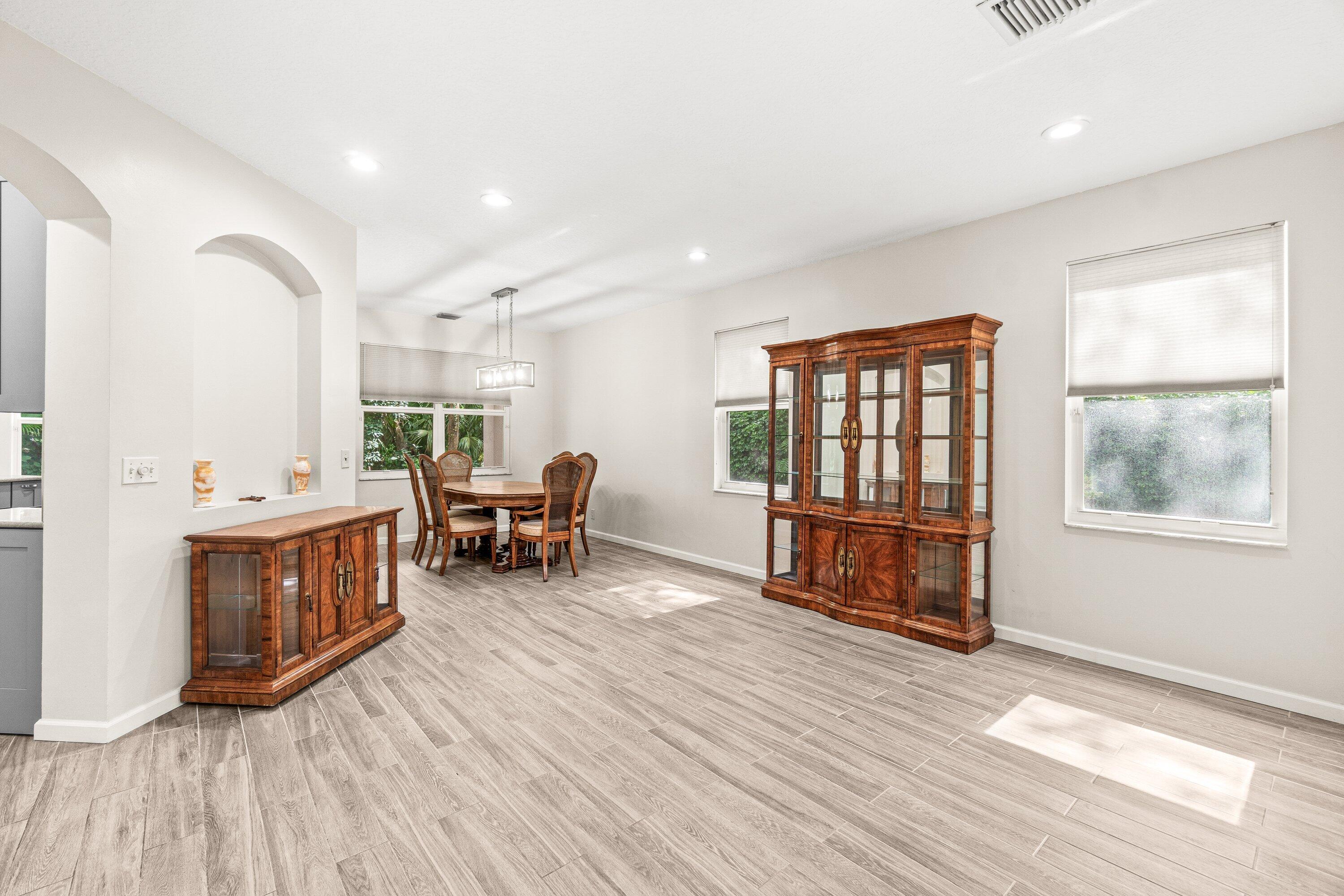 21256 Vía Fiore Boca Raton, FL 33433 - Photo 6 of 42 a living room with furniture and a wooden floor
