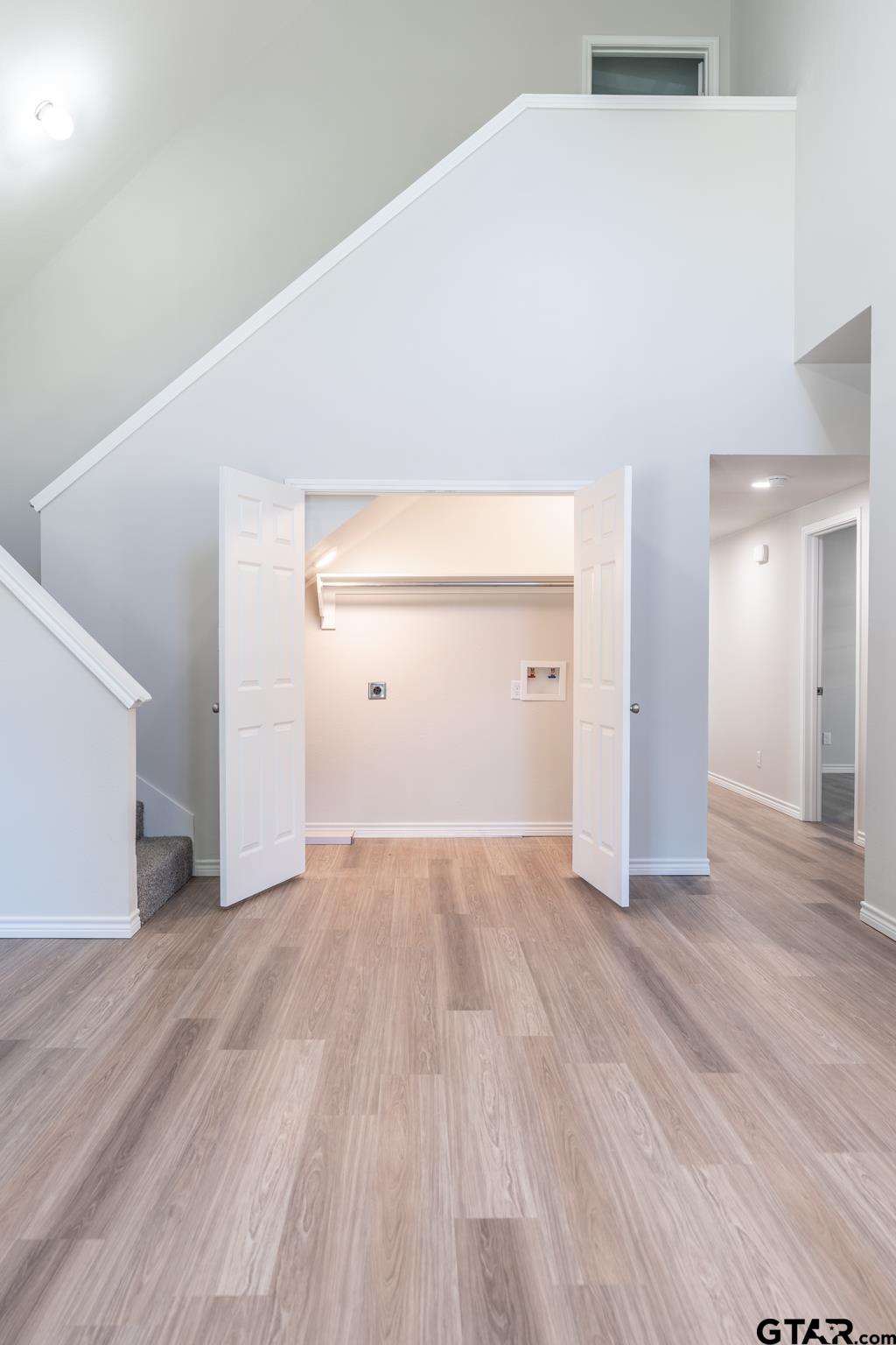 233 Harrison Street Longview, TX 75601 - Photo 25 of 44 a view of empty room with wooden floor