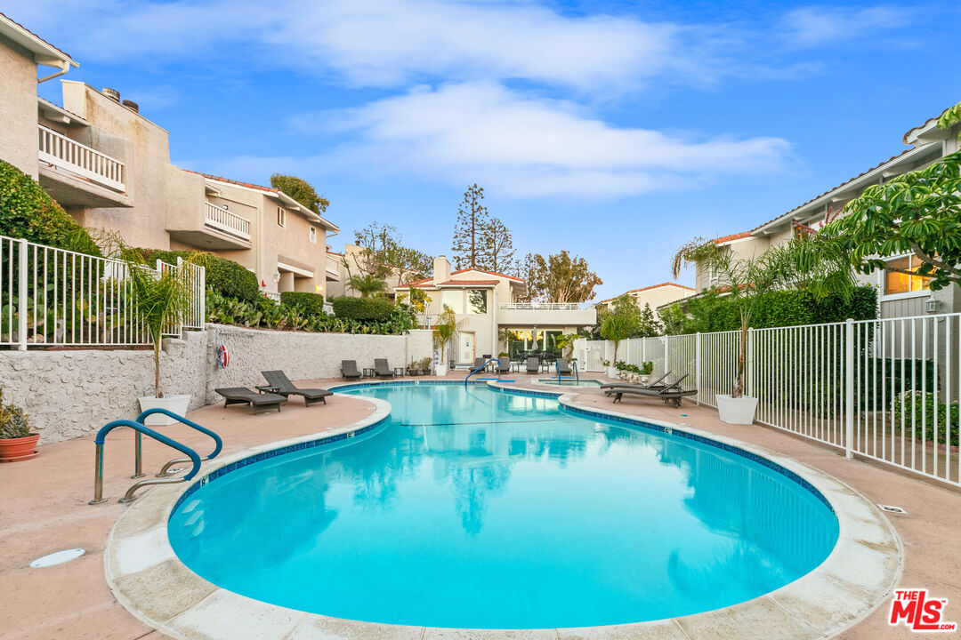 28398 Rey De Copas Lane Malibu, CA 90265 - Photo 41 of 44 a view of a swimming pool with outdoor seating