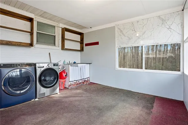 a view of backyard with a deck