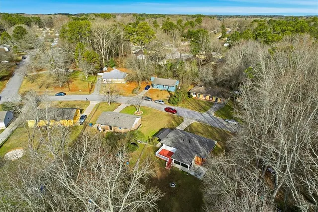 an aerial view of a city with lots of residential buildings
