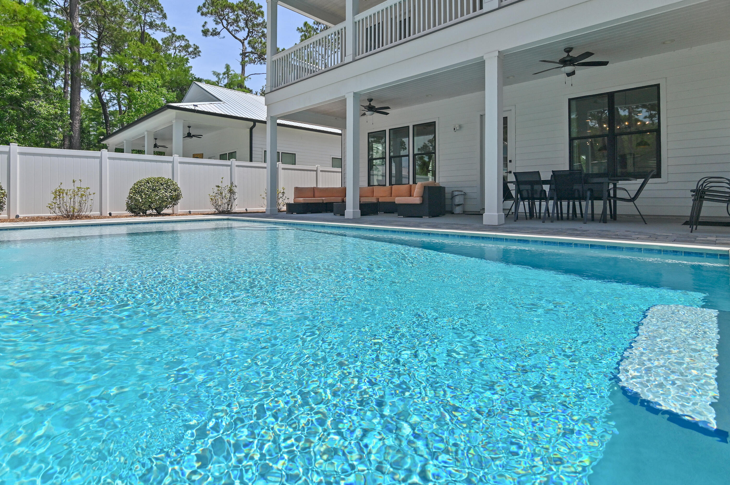 13 Jp Lane Santa Rosa Beach, FL 32459 - Photo 14 of 31 a view of a house with backyard porch and patio