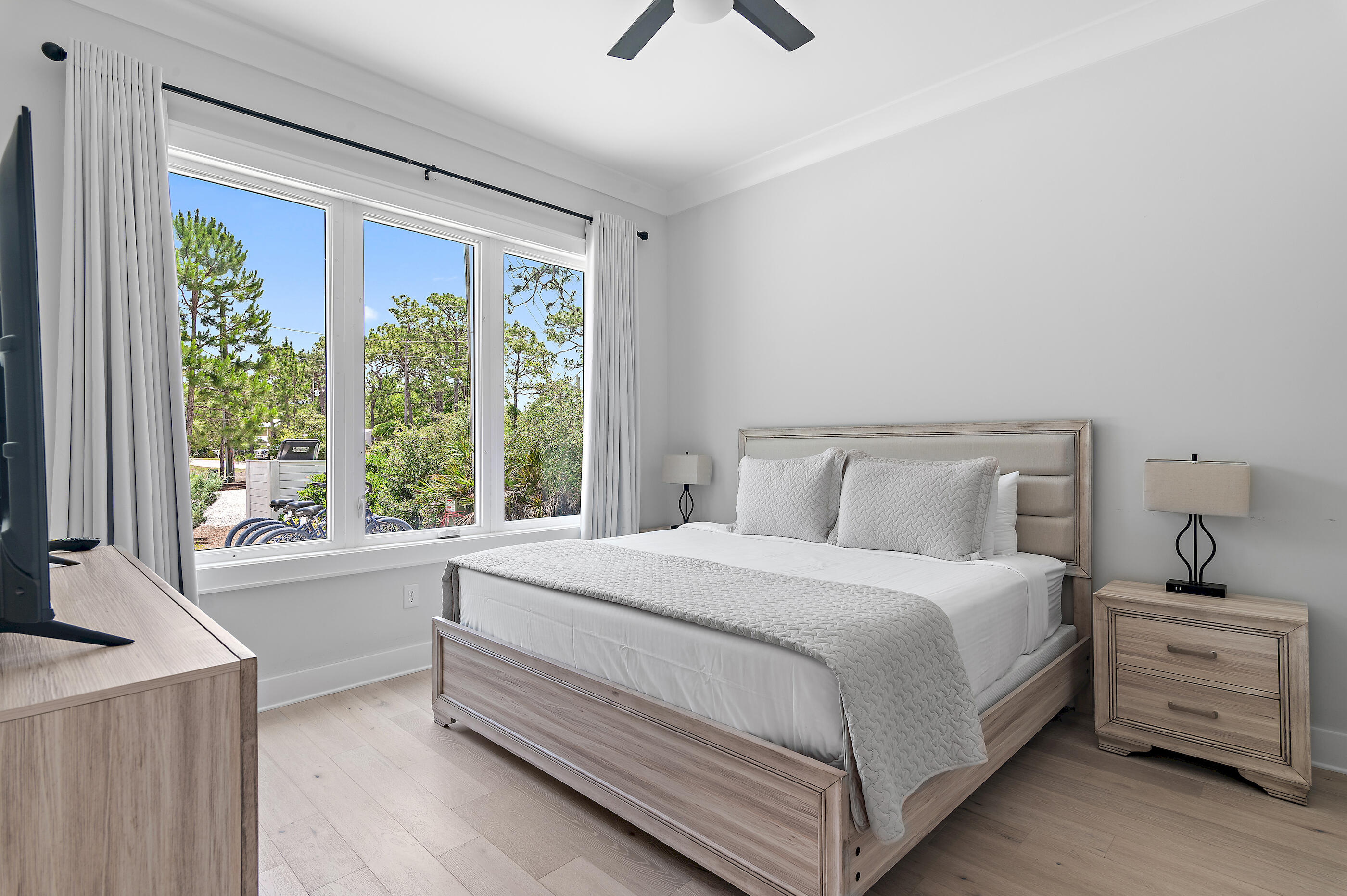 13 Jp Lane Santa Rosa Beach, FL 32459 - Photo 16 of 31 a bedroom with a large bed and a window