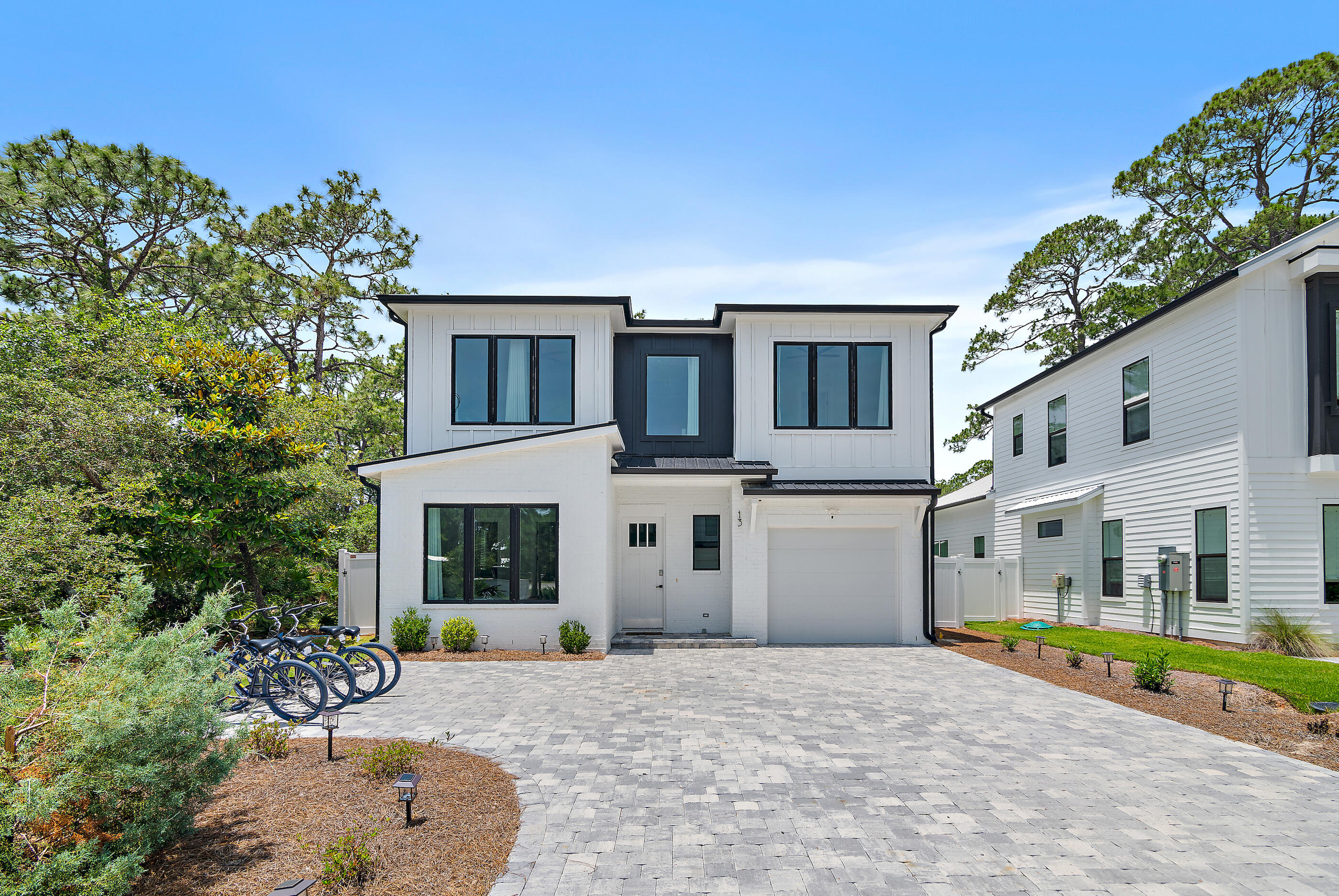 13 Jp Lane Santa Rosa Beach, FL 32459 - Photo 2 of 31 a house with swimming pool in front of it