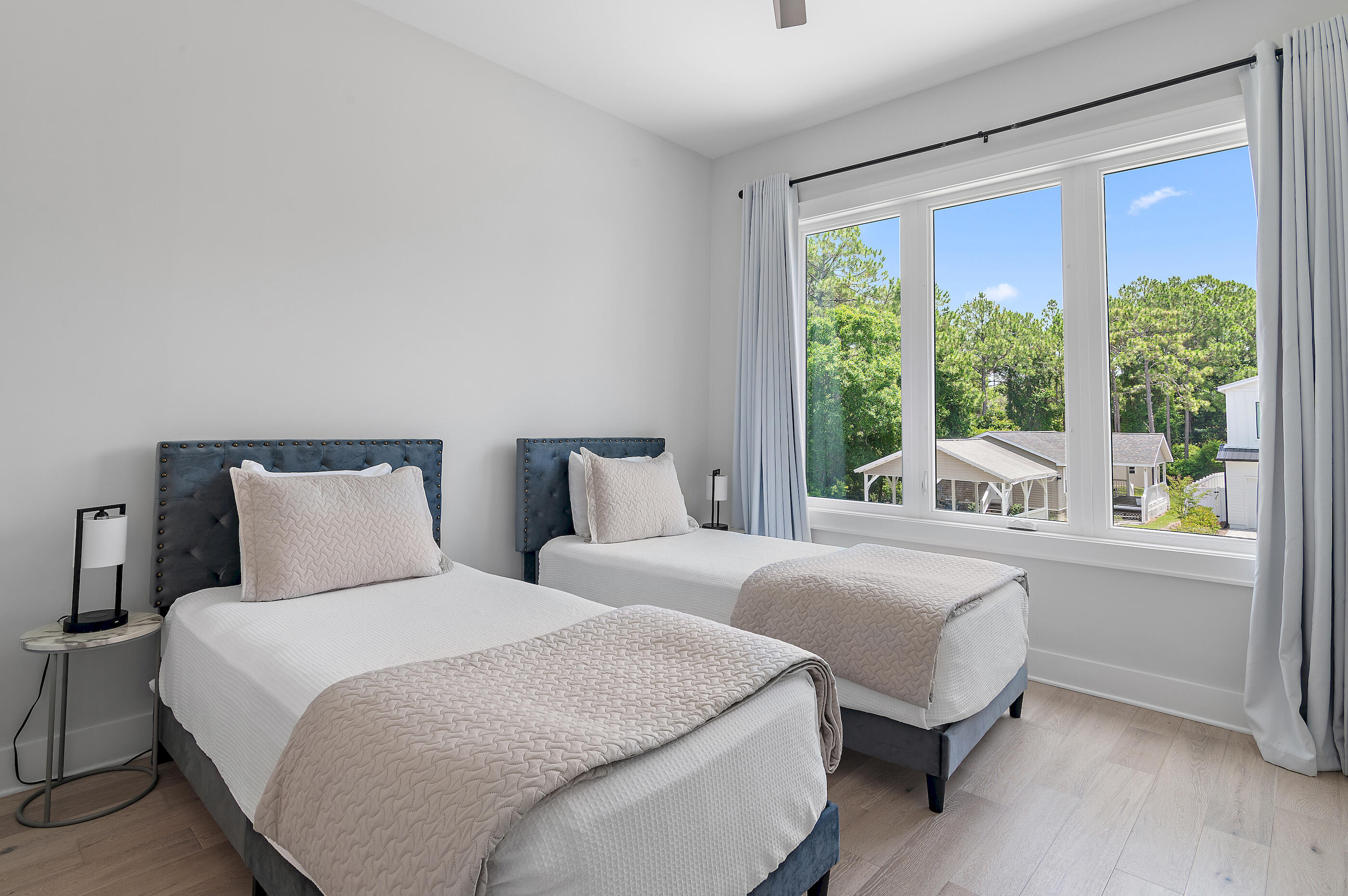 13 Jp Lane Santa Rosa Beach, FL 32459 - Photo 27 of 31 a bedroom with two beds and a large window