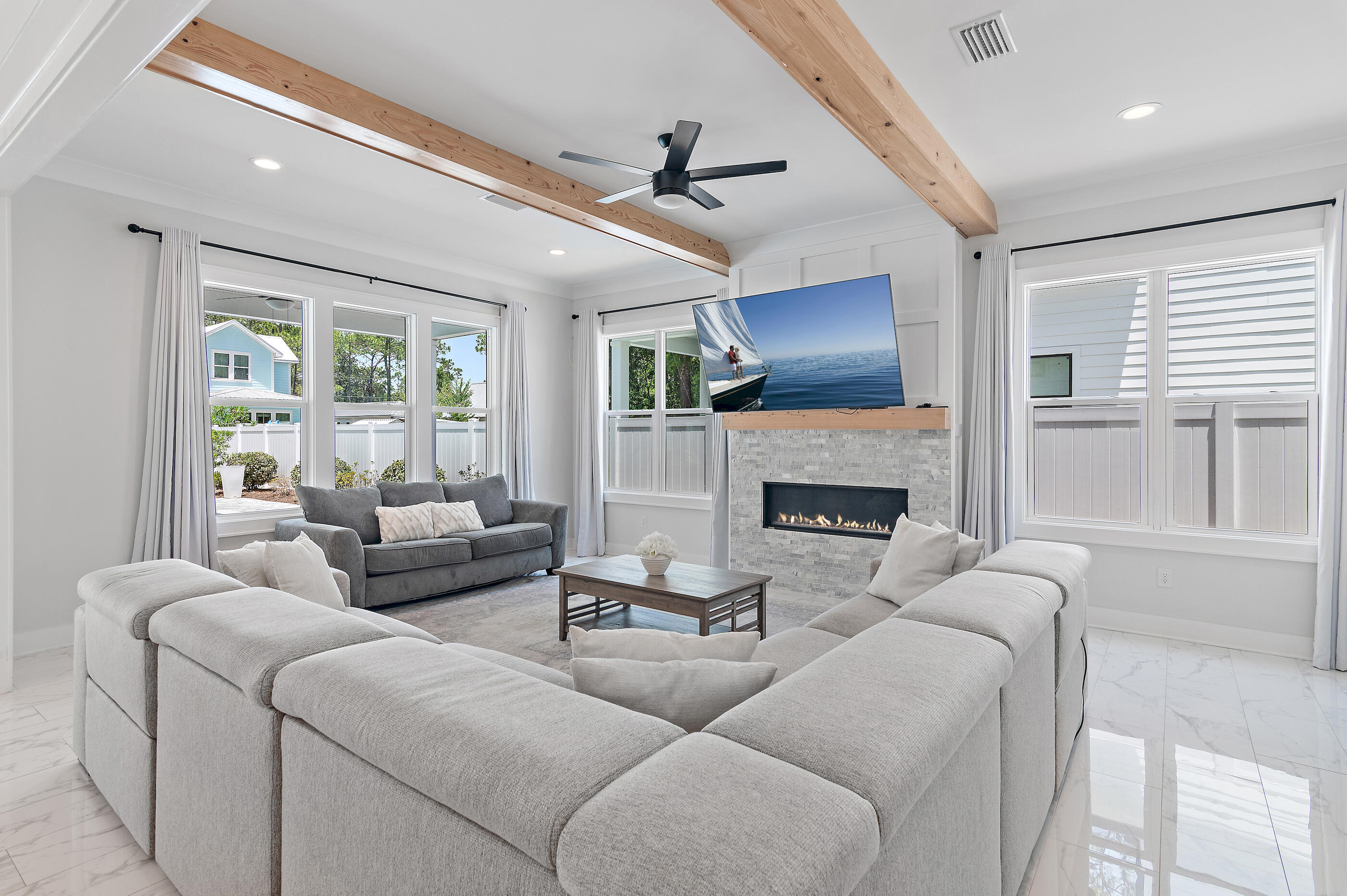13 Jp Lane Santa Rosa Beach, FL 32459 - Photo 3 of 31 a living room with furniture and a fireplace