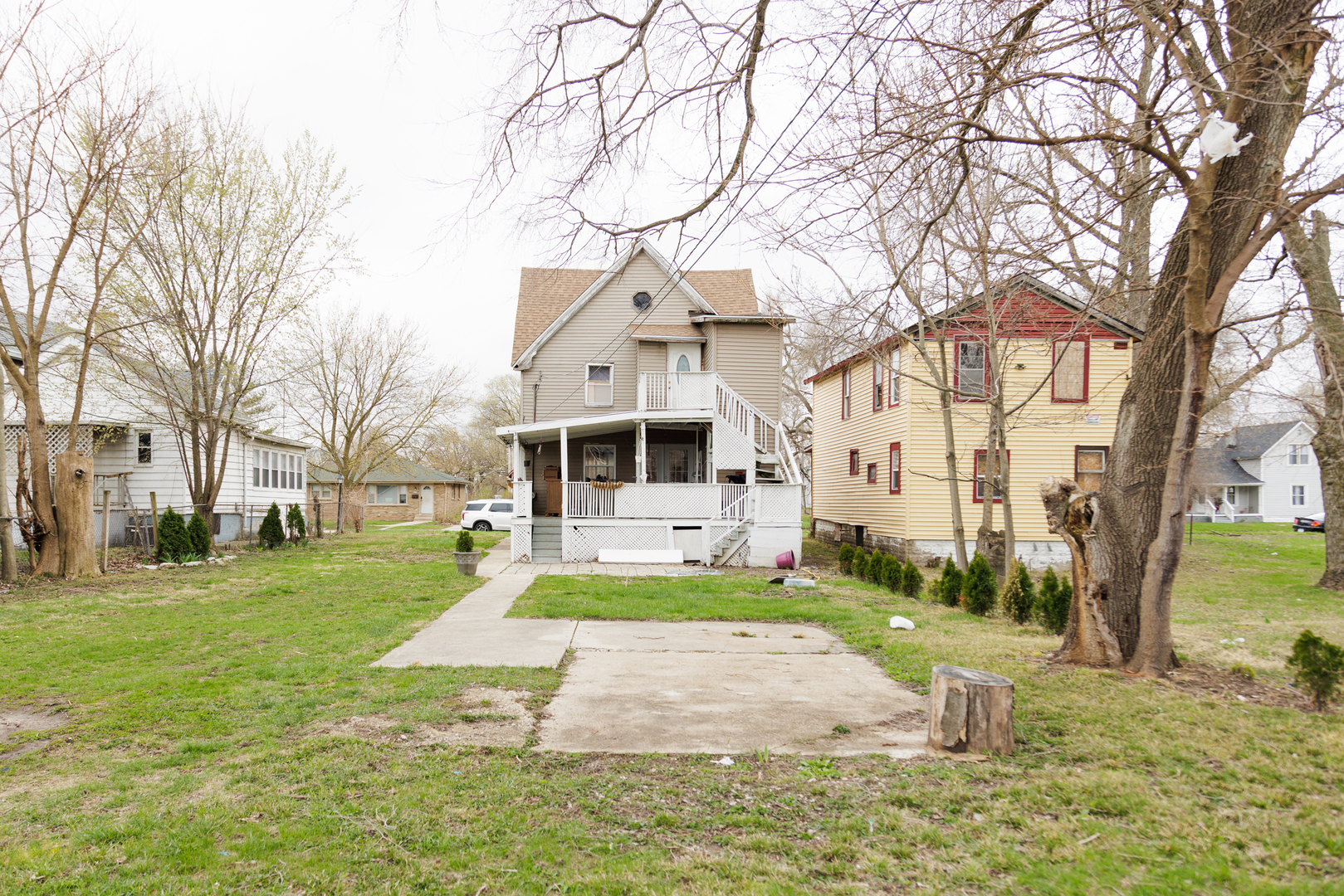 732 North Dearborn Avenue Kankakee, IL 60901 - Photo 15 of 21 a front view of a house with a yard and trees