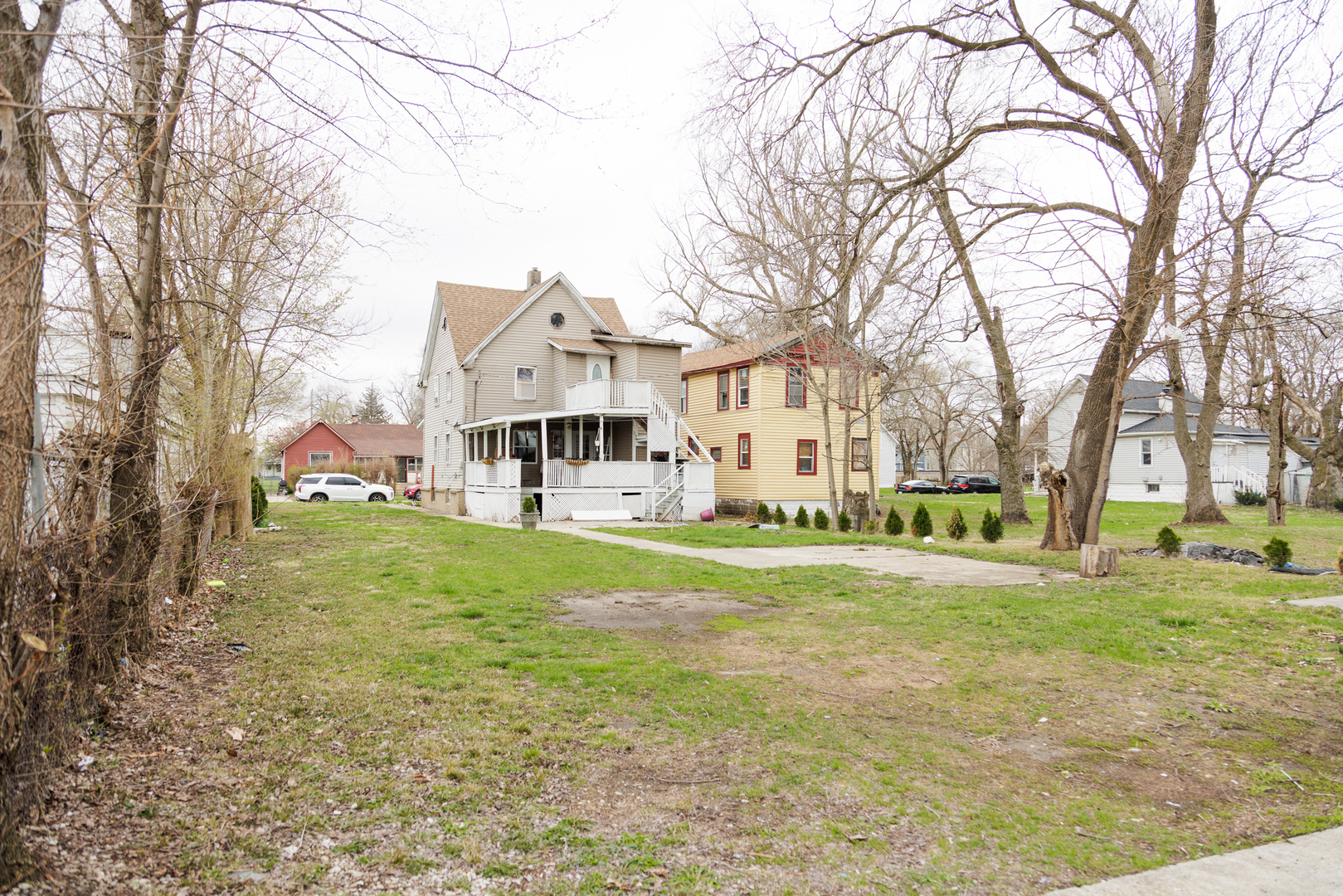 732 North Dearborn Avenue Kankakee, IL 60901 - Photo 18 of 21 a view of a big yard with a house and large trees