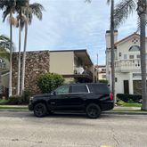 a car parked in front of a house
