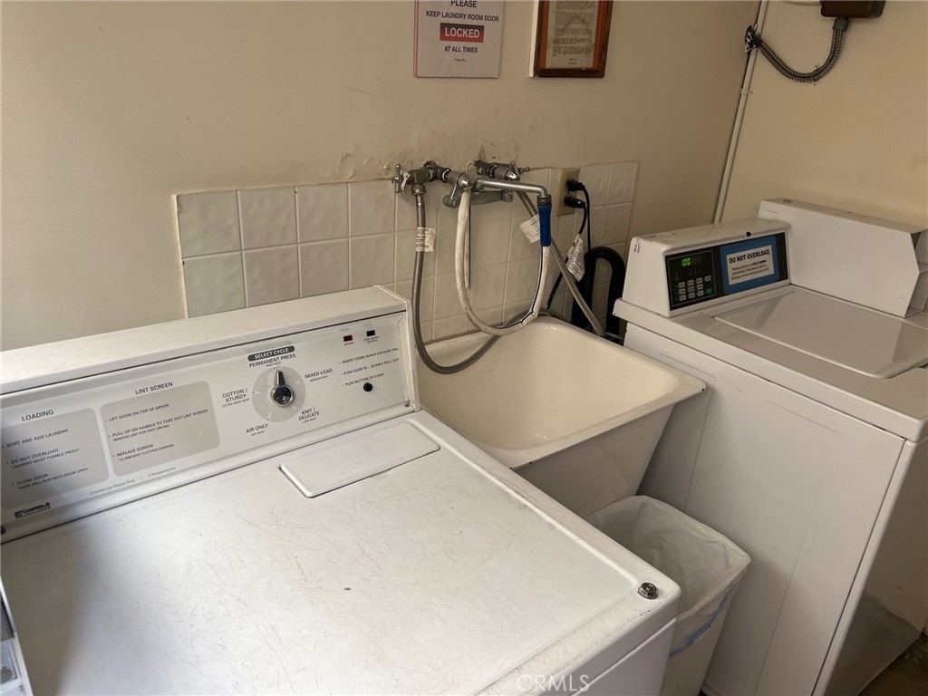 244 5th Street Seal Beach, CA 90740 - Photo 12 of 16 a utility room with dryer and washer