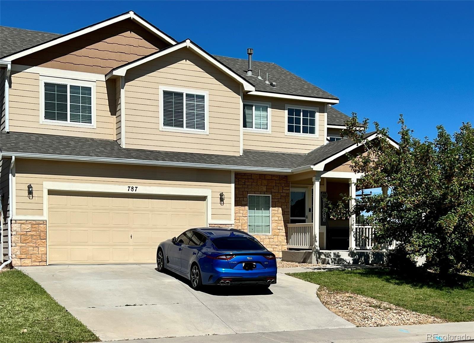 a car parked in front of a house
