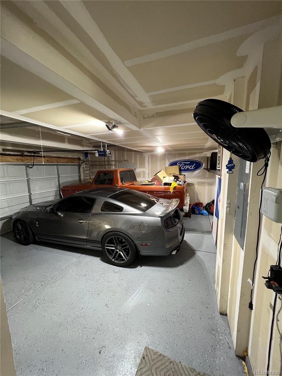 787 Rodgers Circle Platteville, CO 80651 - Photo 15 of 20 a cars parked in a parking room