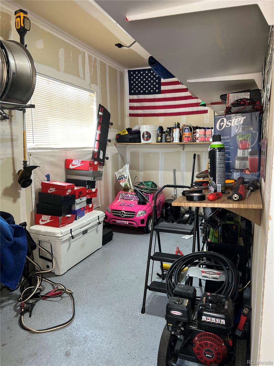 787 Rodgers Circle Platteville, CO 80651 - Photo 16 of 20 a room with gym equipment