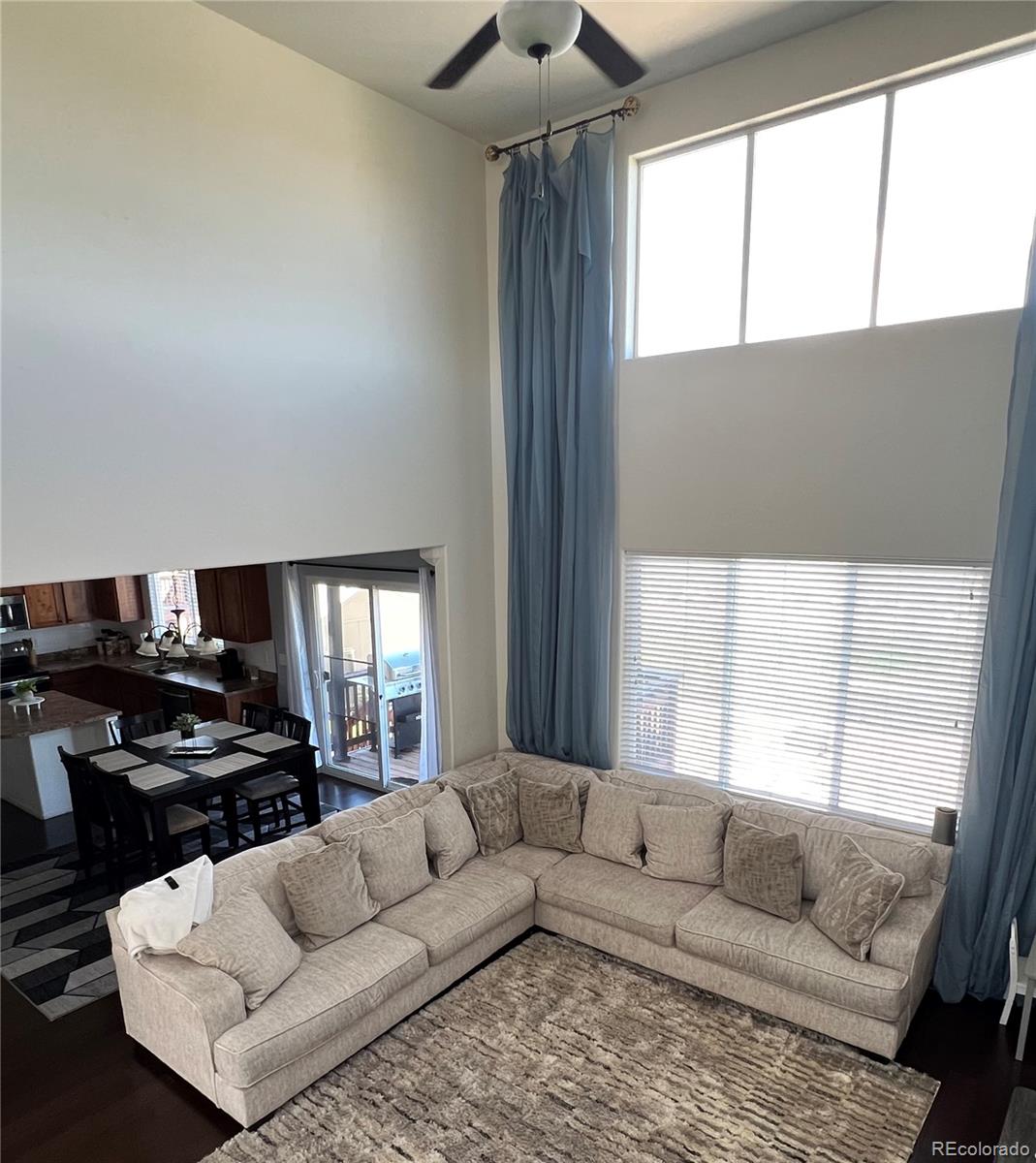 787 Rodgers Circle Platteville, CO 80651 - Photo 6 of 20 a living room with furniture and a flat screen tv