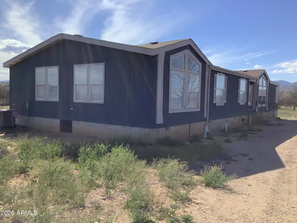 a bathroom with a shower and a tub