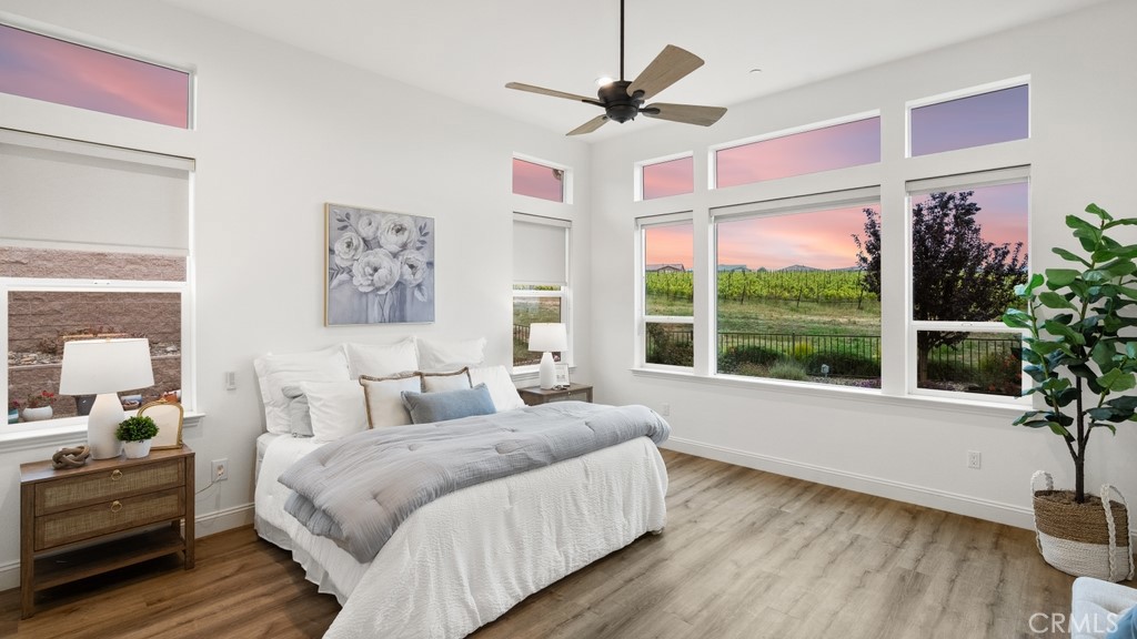 851 Trail View Place Nipomo, CA 93444 - Photo 12 of 47 a spacious bedroom with a large bed and a large window