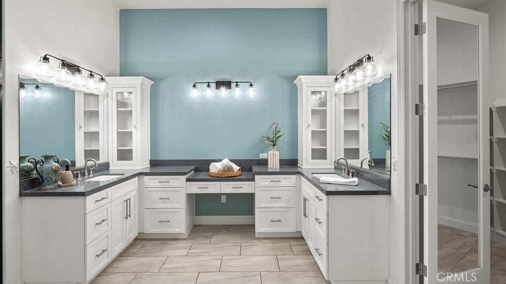 851 Trail View Place Nipomo, CA 93444 - Photo 14 of 47 a bathroom with a double vanity sink mirror and