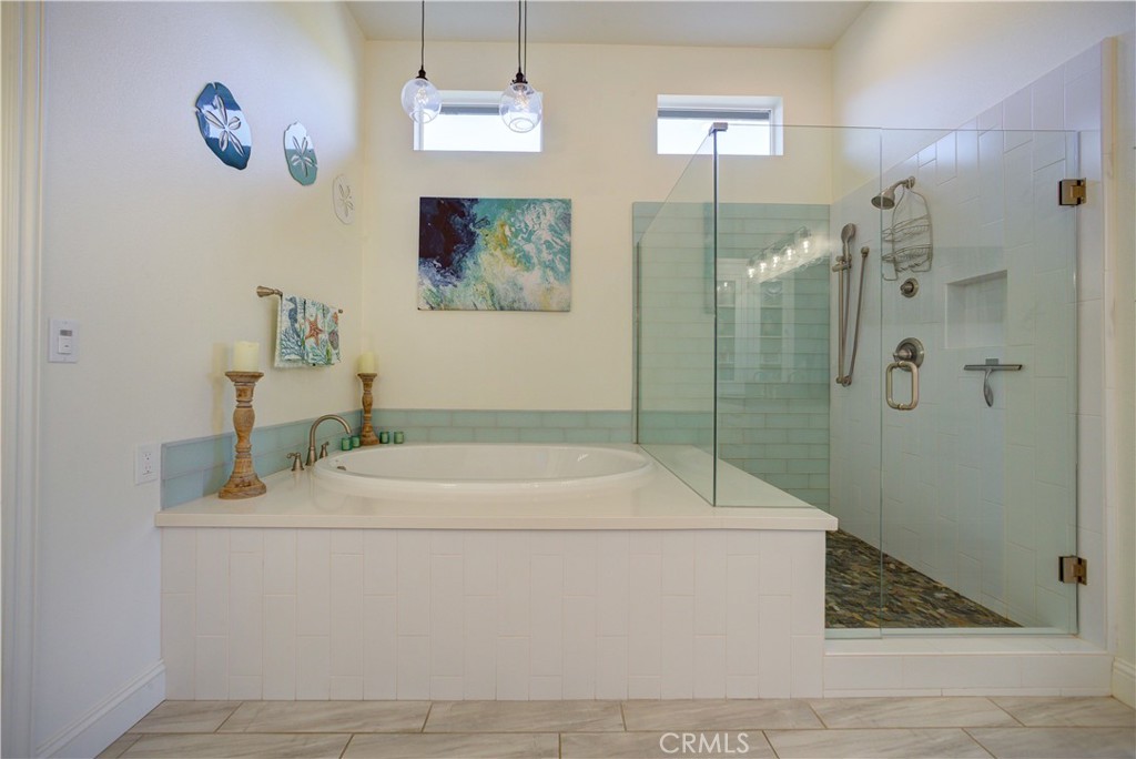 851 Trail View Place Nipomo, CA 93444 - Photo 16 of 47 a bathroom with a sink a toilet and shower