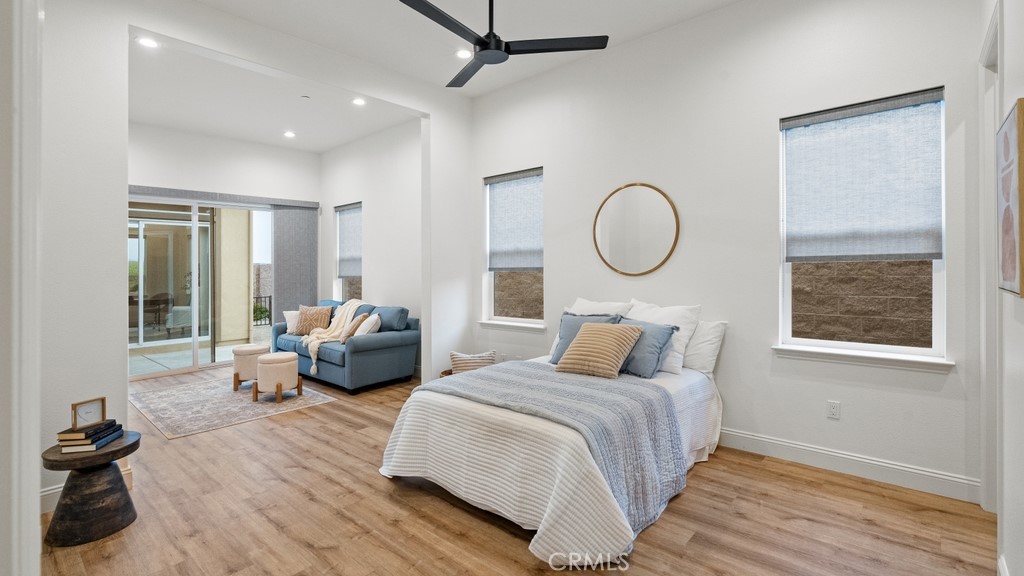 851 Trail View Place Nipomo, CA 93444 - Photo 17 of 47 a bedroom with bed and a chandelier