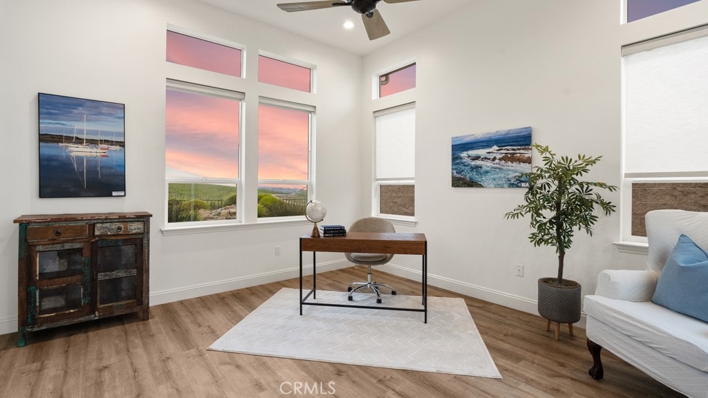 851 Trail View Place Nipomo, CA 93444 - Photo 20 of 47 a living room with furniture a window and a flat screen tv