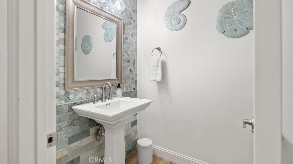 851 Trail View Place Nipomo, CA 93444 - Photo 31 of 47 a bathroom with a sink and mirror with toilet