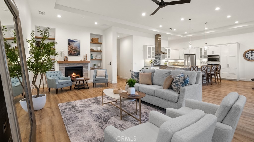 851 Trail View Place Nipomo, CA 93444 - Photo 7 of 47 a living room with furniture kitchen view and a fireplace
