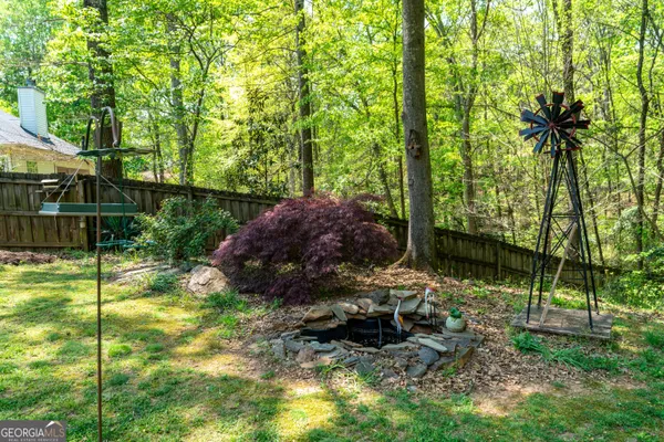 a backyard of a house with lots of green space
