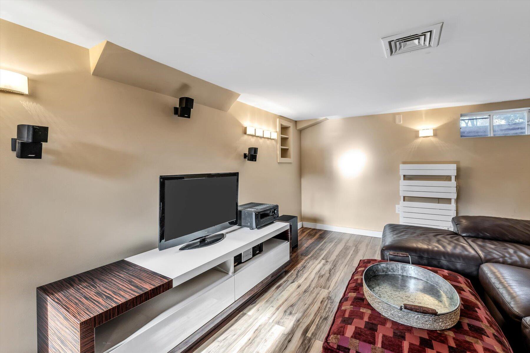 19 Pine Rock Road East Falmouth, MA 02536 - Photo 14 of 52 a living room with furniture and a flat screen tv