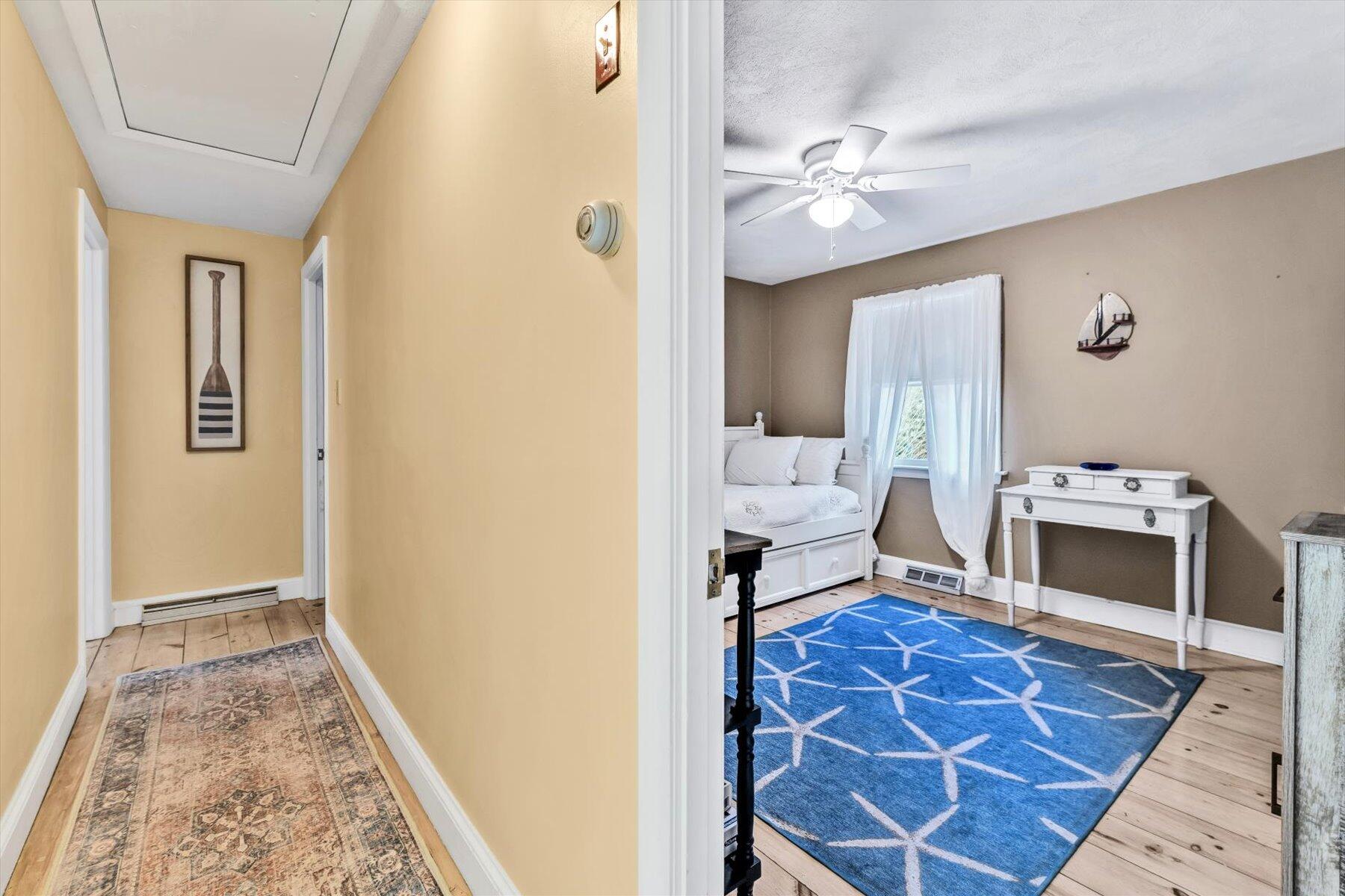 19 Pine Rock Road East Falmouth, MA 02536 - Photo 29 of 52 a living room with furniture and a fireplace