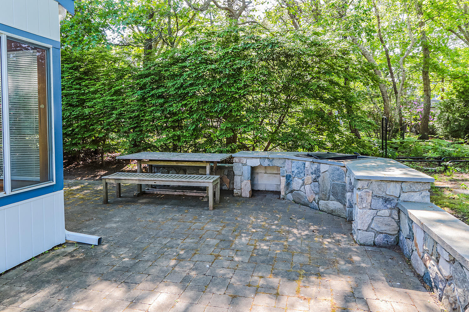 19 Pine Rock Road East Falmouth, MA 02536 - Photo 39 of 52 a view of a backyard with chairs and a swing