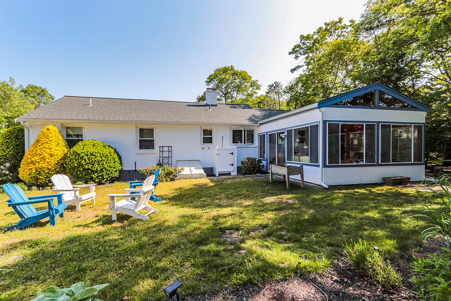 19 Pine Rock Road East Falmouth, MA 02536 - Photo 40 of 52 a view of a house with pool and chairs