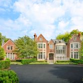 front view of a house with a garden
