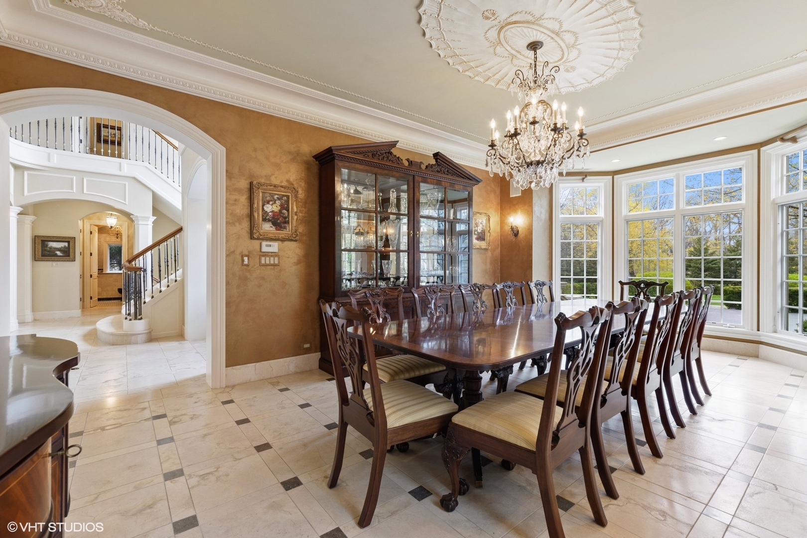 1451 North Green Bay Road Lake Forest, IL 60045 - Photo 13 of 55 a view of a dining room with furniture wooden floor and chandelier
