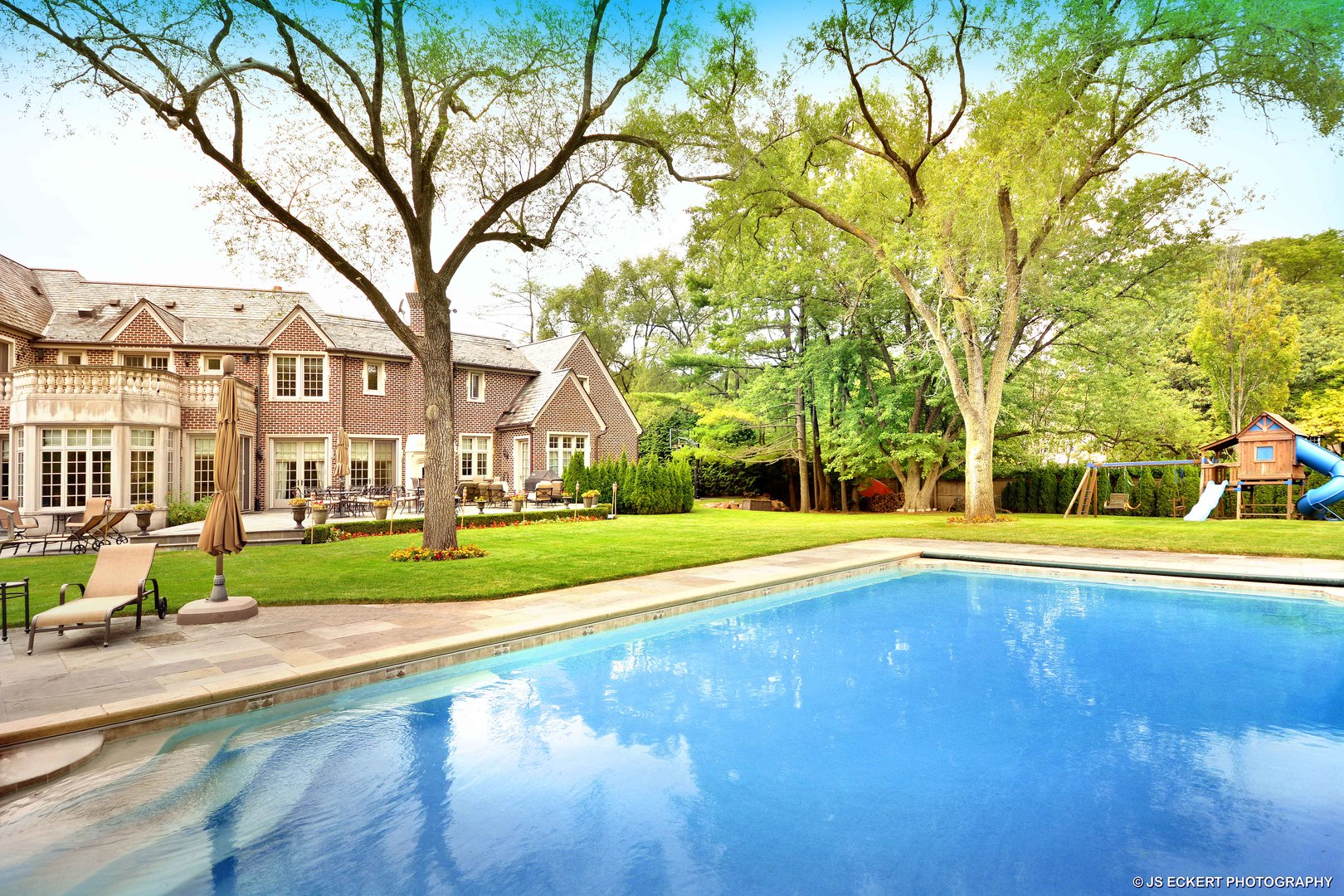 1451 North Green Bay Road Lake Forest, IL 60045 - Photo 2 of 55 a view of yard with swimming pool and green space