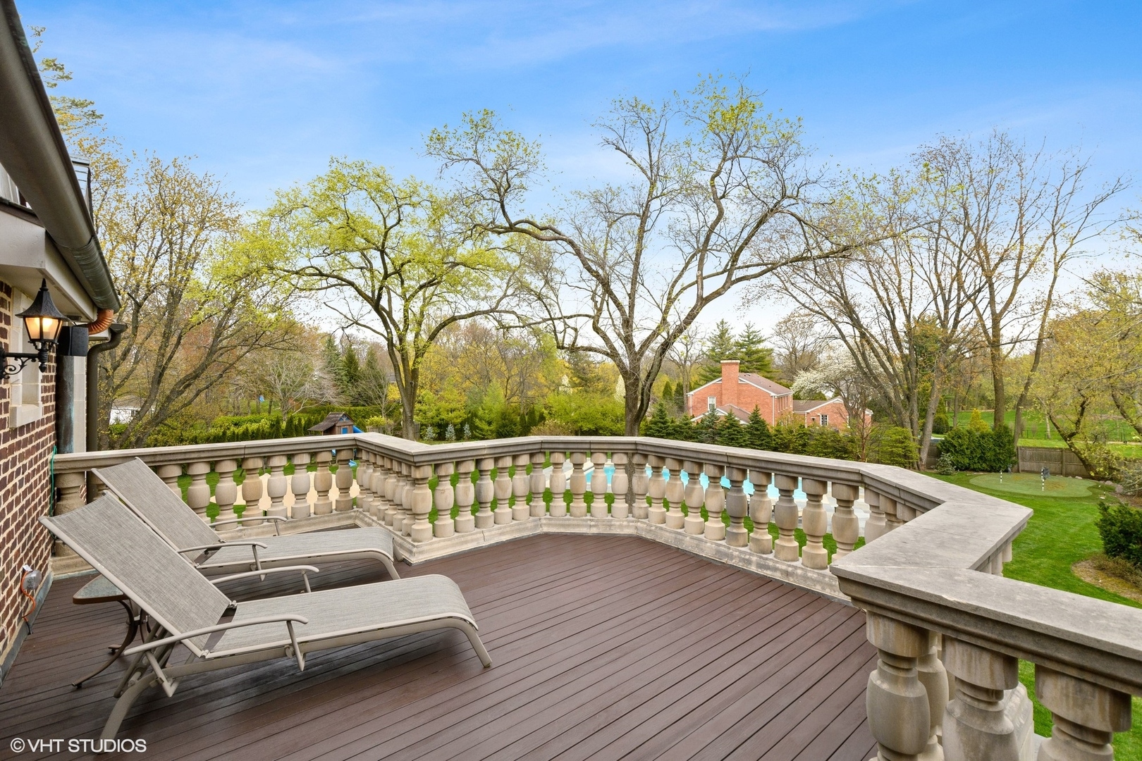 1451 North Green Bay Road Lake Forest, IL 60045 - Photo 29 of 55 a view of a roof deck with couches chairs and wooden floor