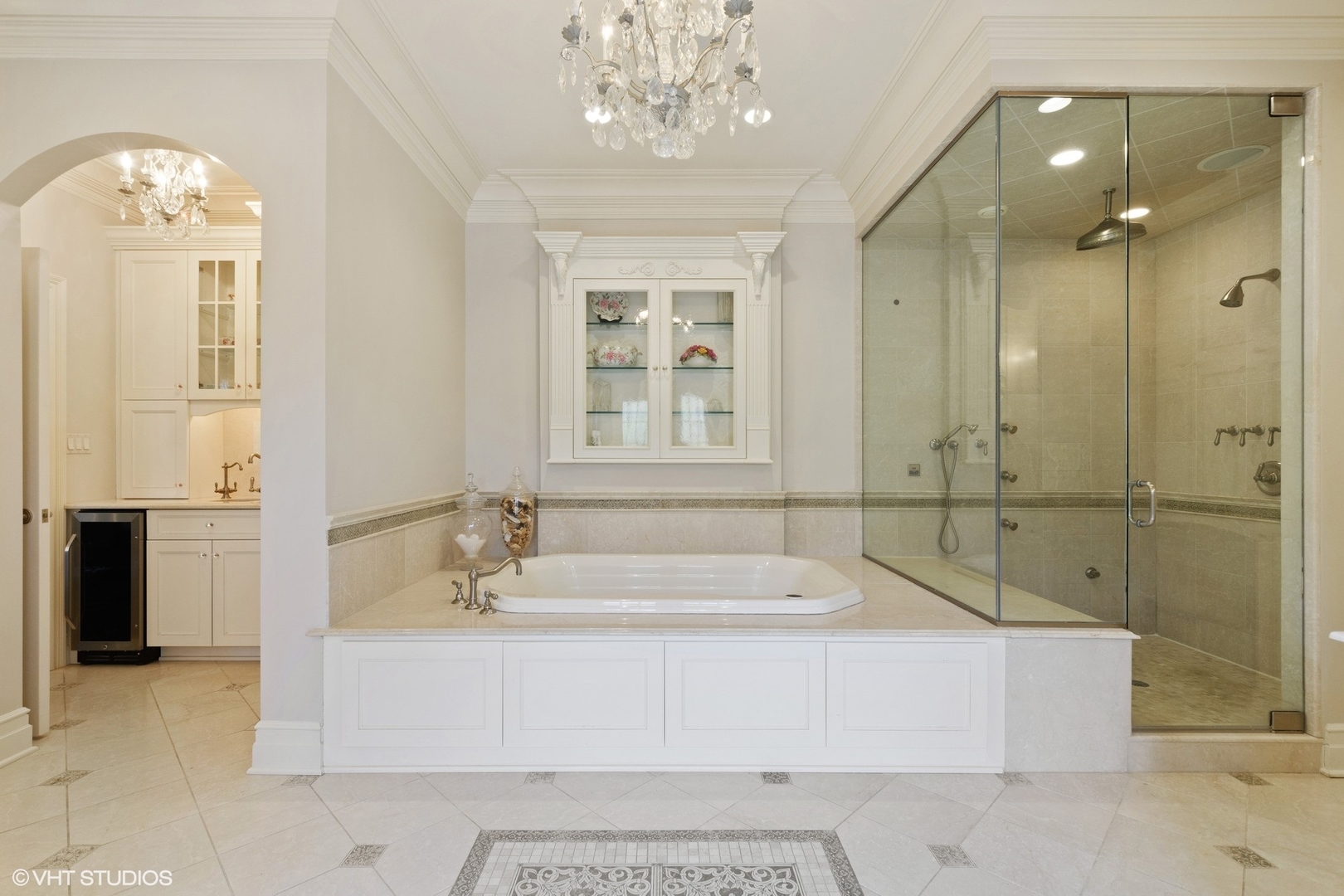 1451 North Green Bay Road Lake Forest, IL 60045 - Photo 30 of 55 a spacious bathroom with a tub sink and mirror