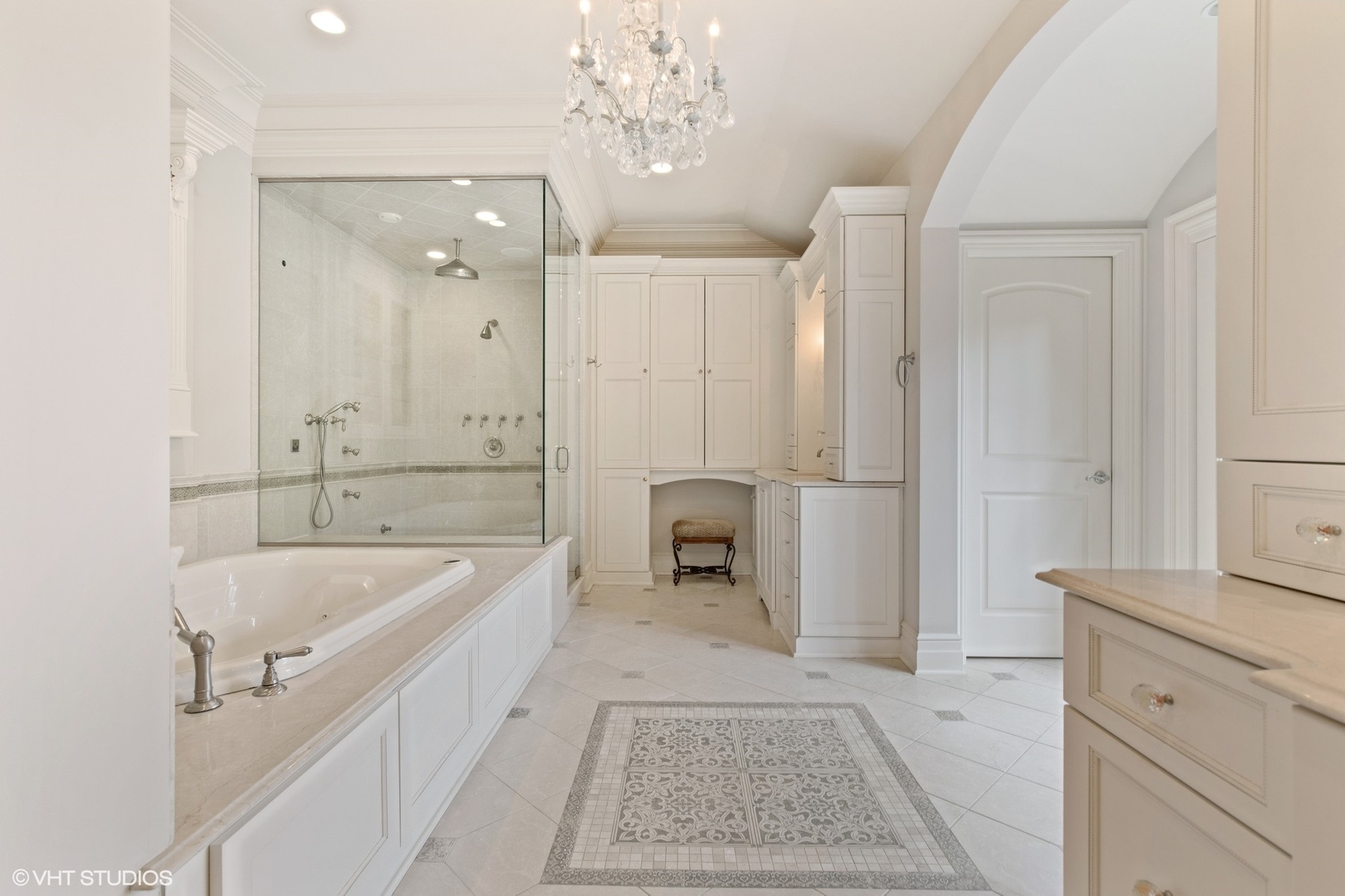 1451 North Green Bay Road Lake Forest, IL 60045 - Photo 32 of 55 a spacious bathroom with a tub sink and mirror
