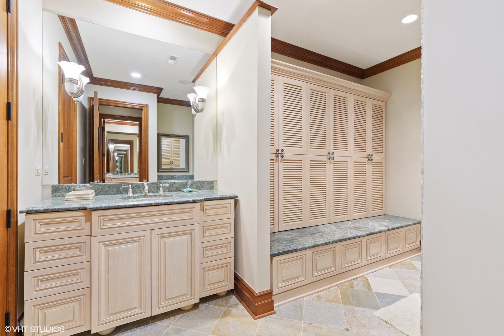 1451 North Green Bay Road Lake Forest, IL 60045 - Photo 48 of 55 a bathroom with a granite countertop sink and a mirror