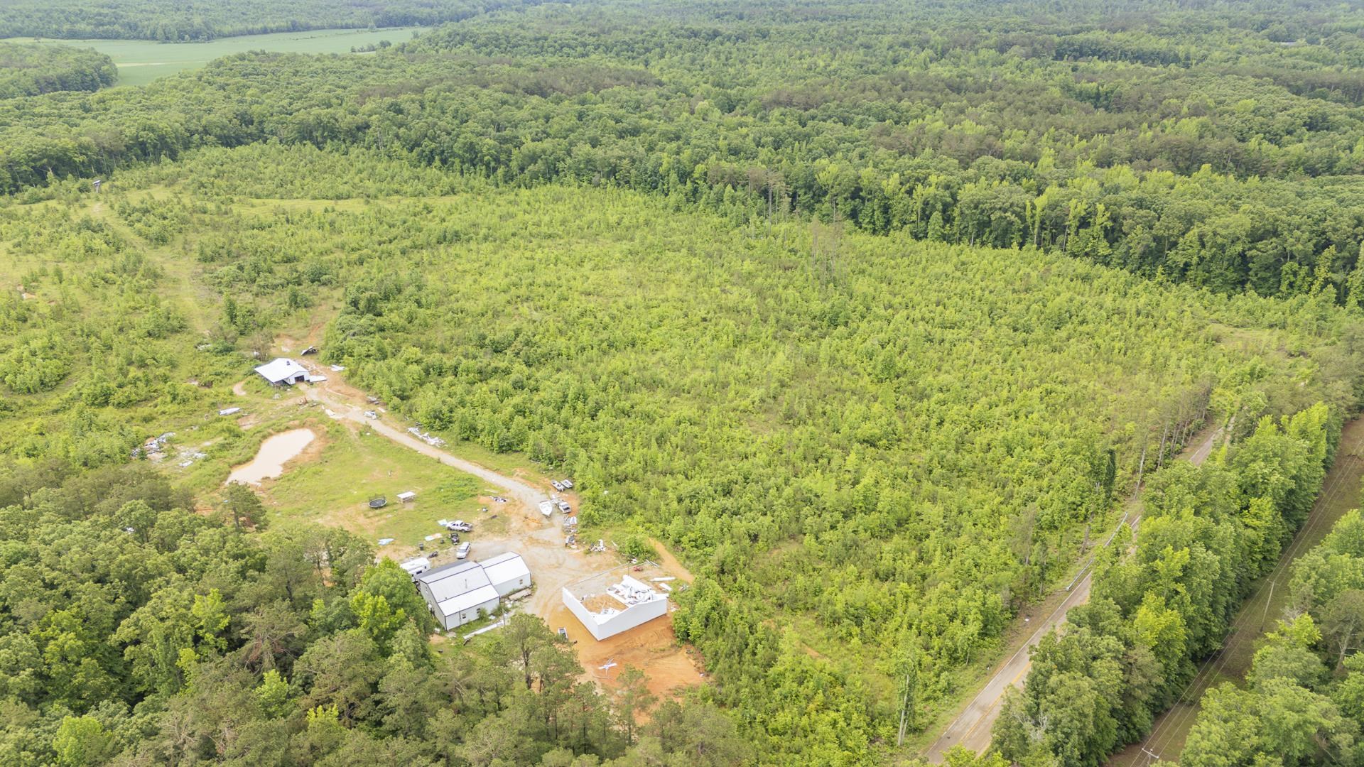 0 Leapwood Enville Road Adamsville, TN 38310 - Photo 8 of 38 a view of a big yard with large trees