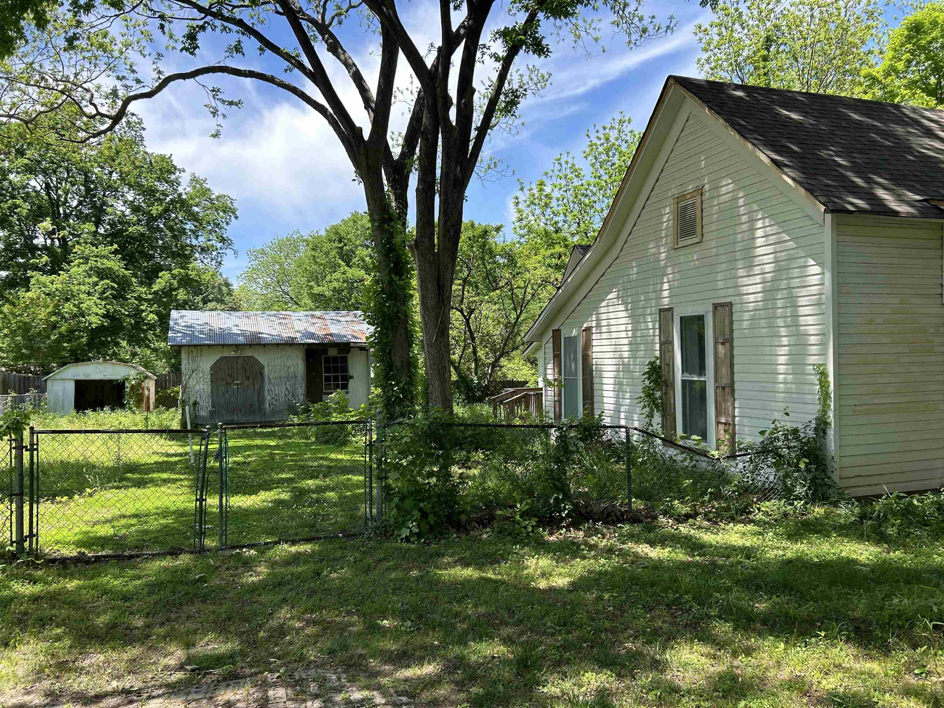 605 Byars Street Covington, TN 38019 - Photo 2 of 11 a front view of house with yard and green space
